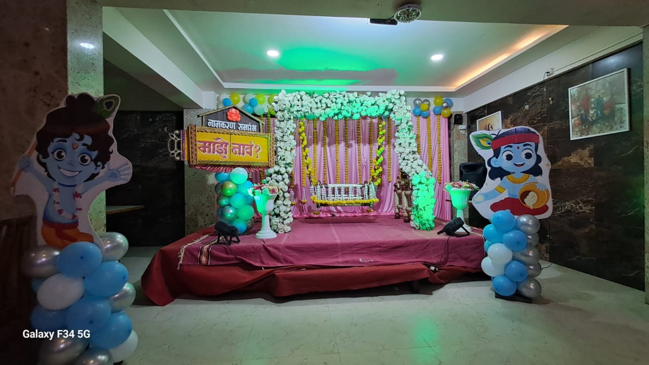 Baby in jungle theme with panda toys and green leaves